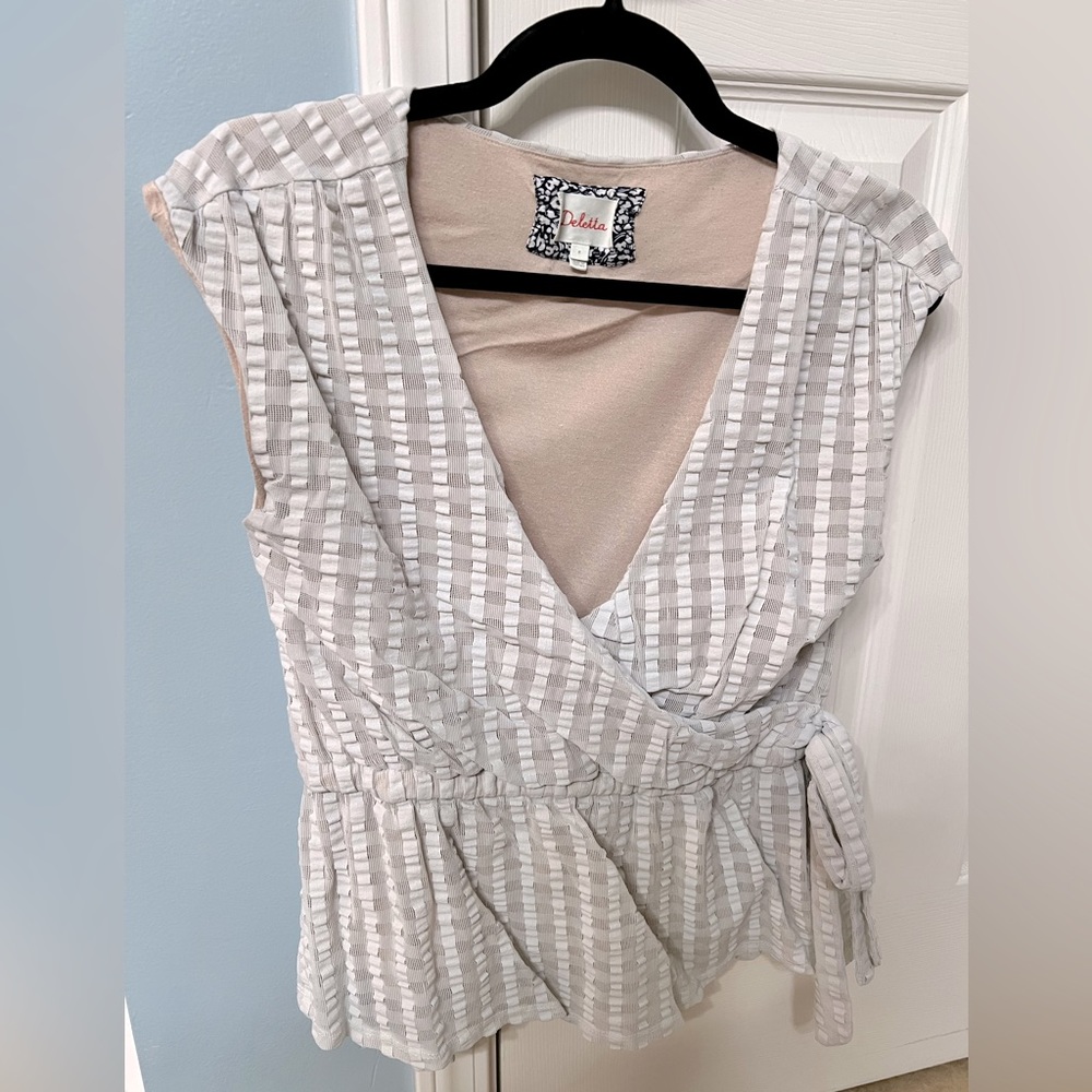 Anthropologie Deletta Ivory/Off White wrap peplum top, size medium.